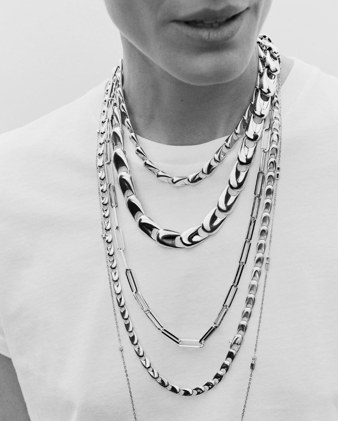 Model wearing KINRADEN Electra necklaces in different lengths.
